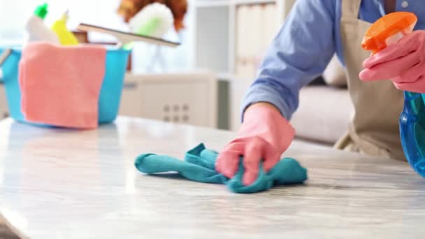 depositphotos_195005658-stock-video-professional-maid-cleaning-table-carefully