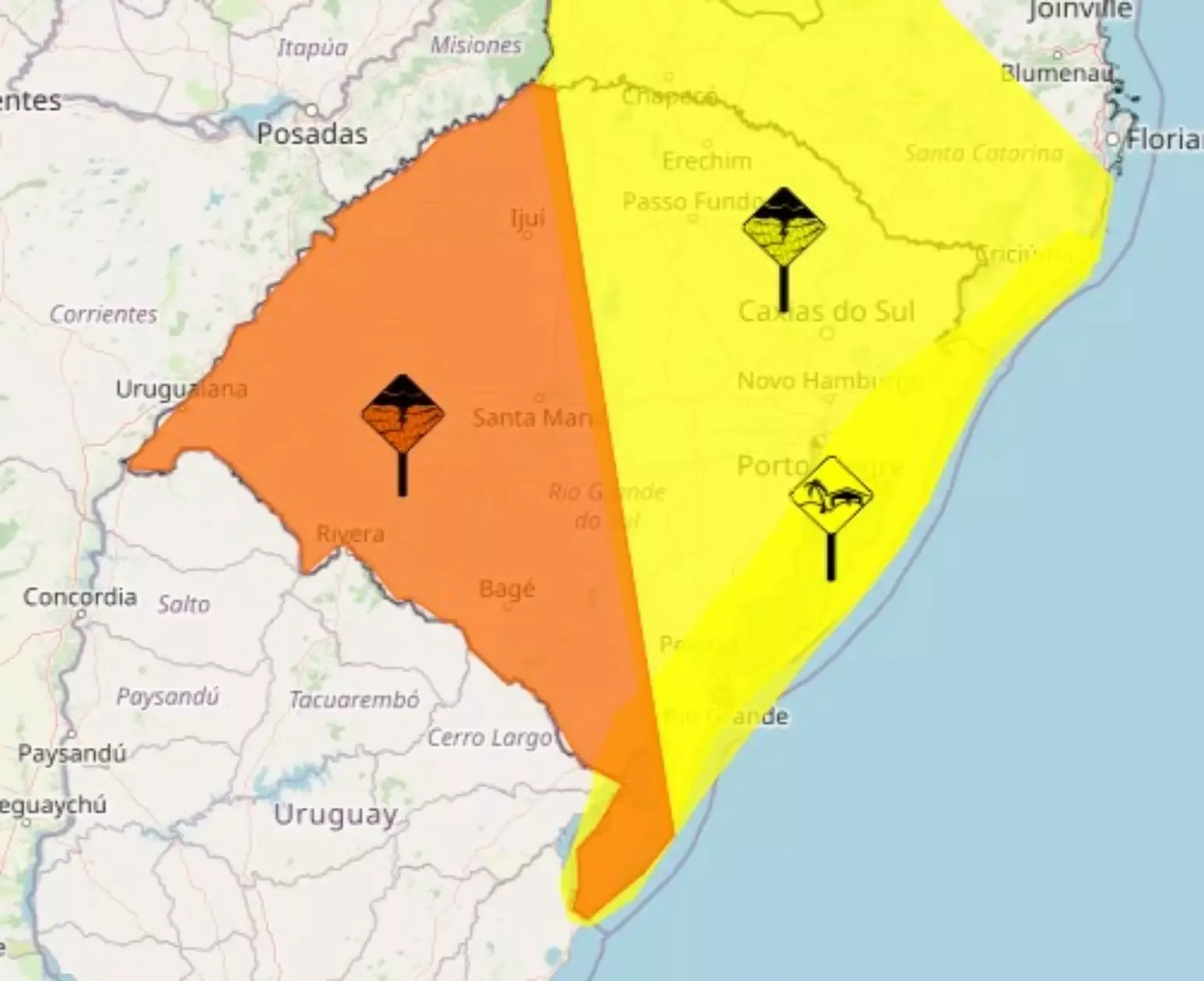Céu nublado e chuva intensa no Rio Grande do Sul durante alerta do INMET.