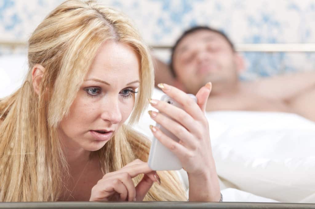 Wife-Checking-Husbands-Phone-1024x682