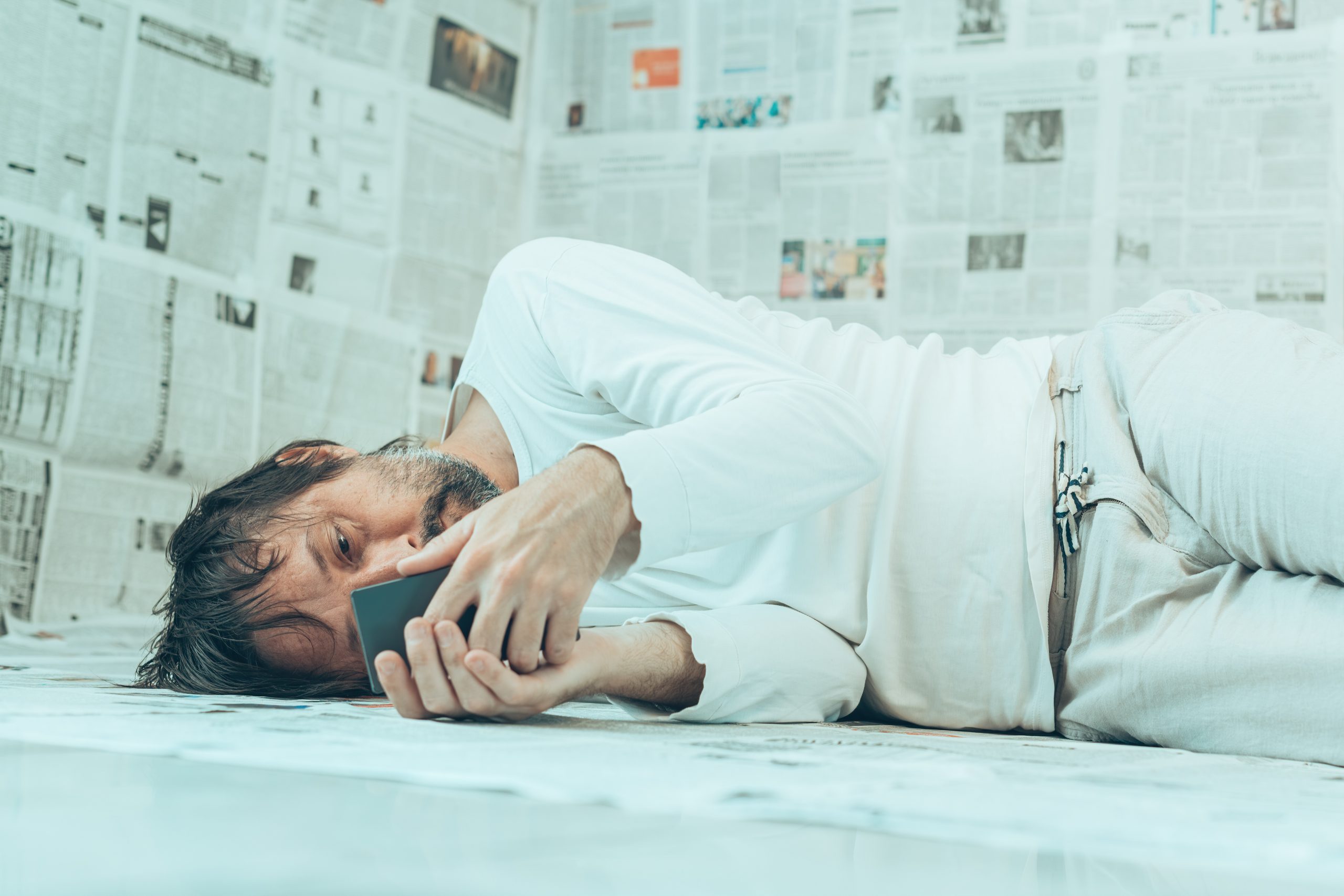 Misinformation infodemic delusion concept, man with mental health problems due to excessive amount of information