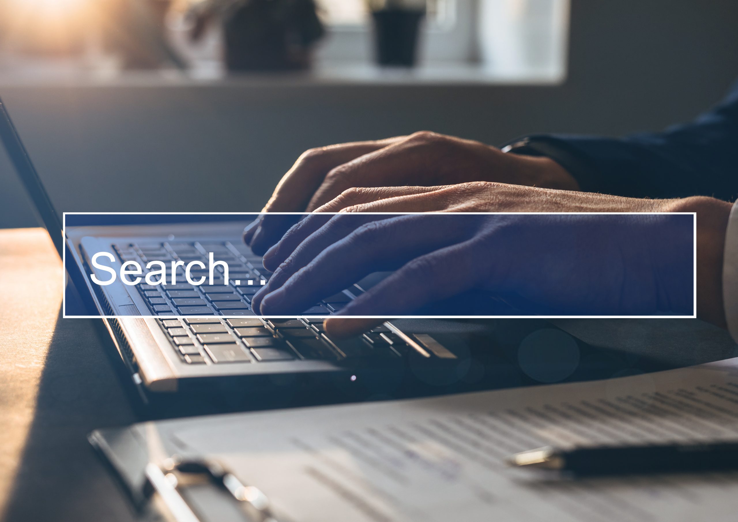 Man tapping laptop keyboard and search page on computer touch sc